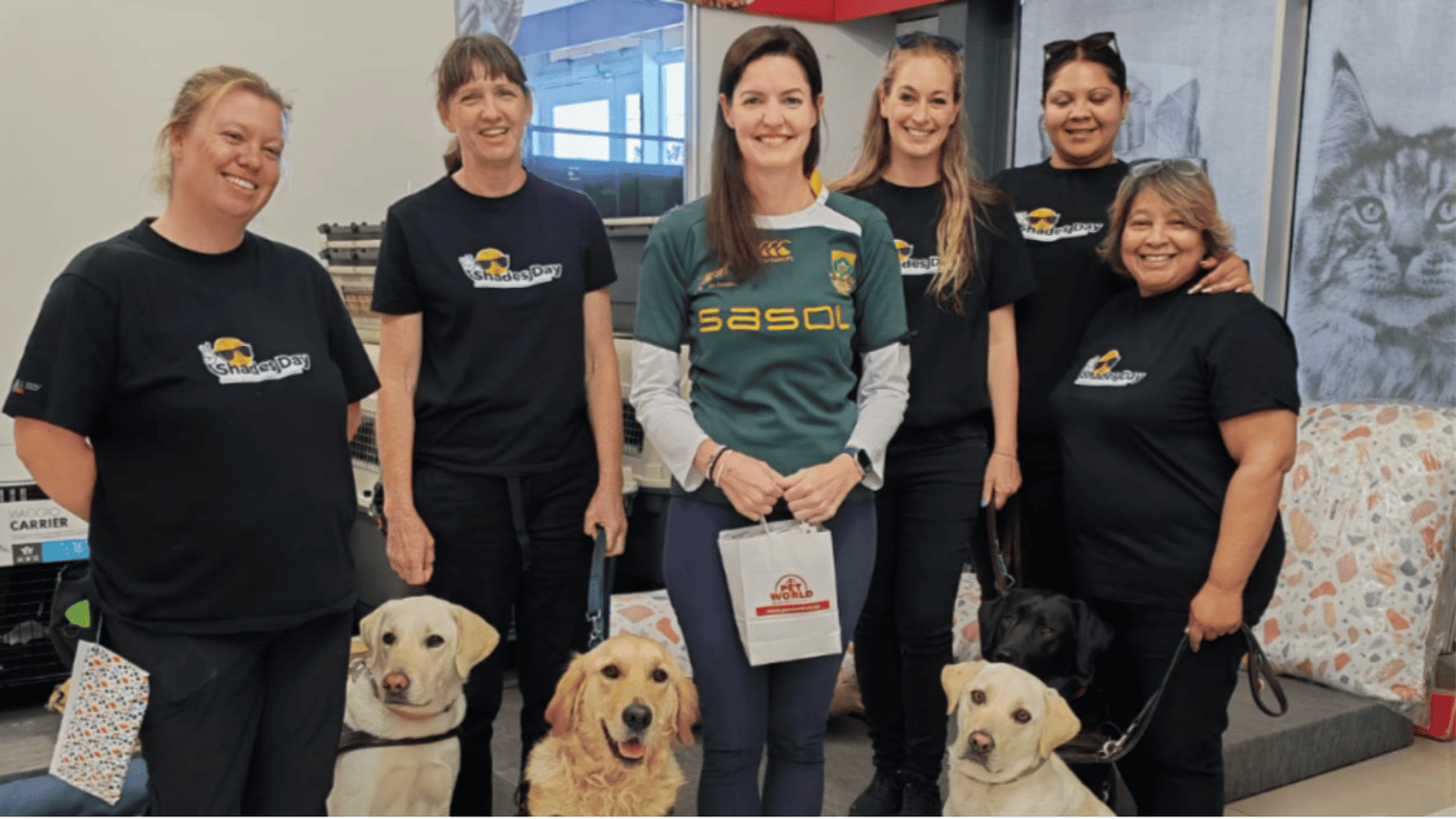 The SA Guide Dogs Associations Team, trainers and dogs in training.
